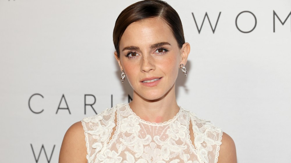 Emma Watson wears lace alexander mcqueen dress and attends The Kering Foundation's Caring for Women dinner at The Pool on Park Avenue on Sept. 15 in New York City.