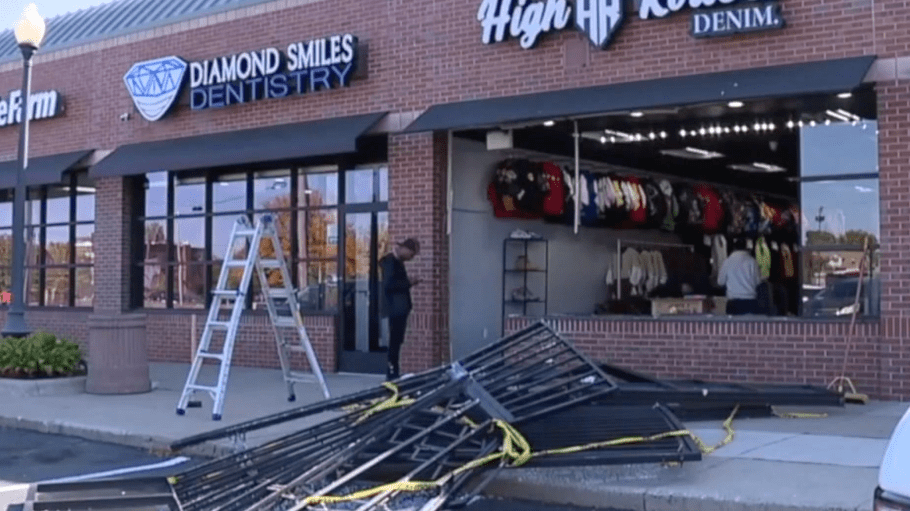 Remnants of the damaged windows and door at High Rollers Denim, presumably marred by a truck ahead of a "smash-and-grab" robbery, are seen here laying on the storefront's sidewalk and parking lot.
