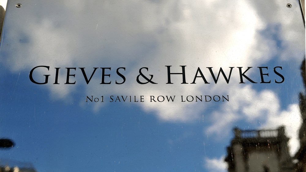 The front door sign of the Gieves & Hawkes in Saville Row central London, which was established in 1771.