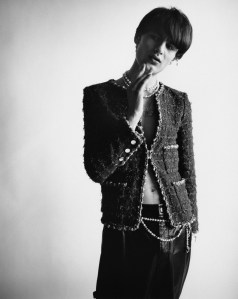 Joomi Lim’s pearl drop ear cuff; Tiffany & Co.’s HardWear freshwater pearl necklace in sterling silver; Veert’s green polka dot and freshwater pearl necklace and green and pink logo pendant with chain; Vacheron Constantin’s watch. Chanel cotton tweed jacket and Helmut Lang leather pants; Chanel metal, glass and resin belt; Celine boots.