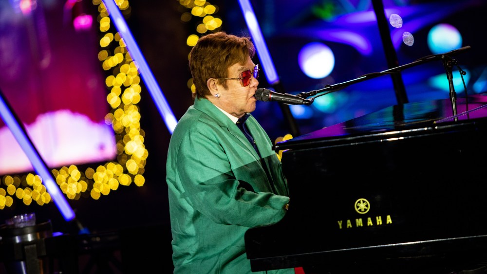 Sir Elton John performs in the opening ceremony for Saks Fifth Avenue’s Holiday Windows and Light show on November 22, 2022 in New York City.