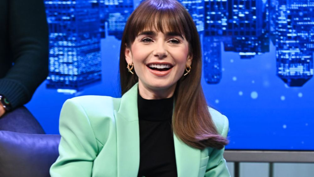 NEW YORK, NEW YORK - DECEMBER 14: Lily Collins attends SiriusXM's Town Hall with the cast of 'Emily In Paris' at SiriusXM Studios on December 14, 2022 in New York City. (Photo by Noam Galai/Getty Images for SiriusXM)
