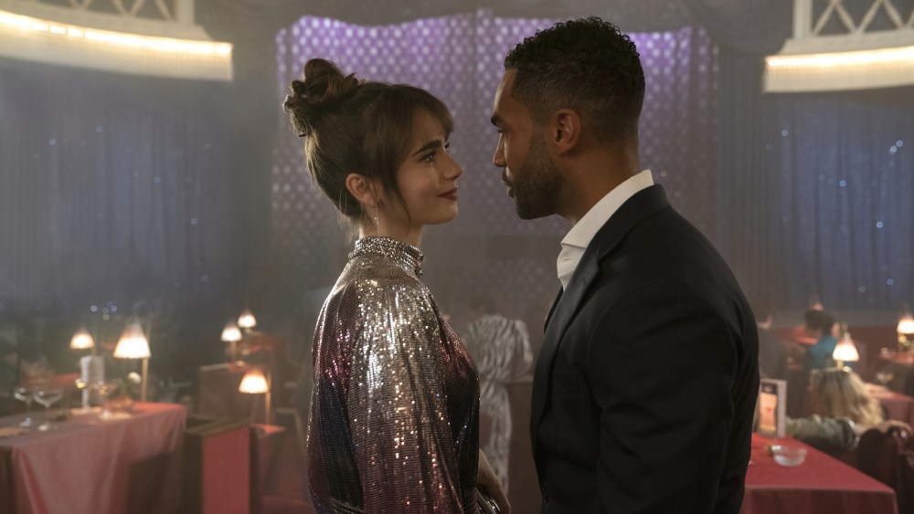Emily in Paris. (L to R) Lily Collins as Emily, Lucien Laviscount as Alfie in episode 303 of Emily in Paris. Cr. Stéphanie Branchu/Netflix © 2022