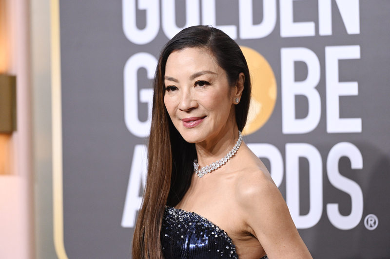 Michelle Yeoh in armani prive blue dress at the 2023 Golden Globe Awards on Jan. 10, 2023 in Beverly Hills.