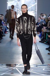BERLIN, GERMANY - JANUARY 17: A model walks the runway at the VORN -The Berlin Fashion Hub x NEWEST runway show, pullover by Sophia Schneiderbyesleben, jewelry by Lani Lees, shoes by Trippen, pants are stylist's own, during the Berlin Fashion Week AW23 at Kant-Garagen on January 17, 2023 in Berlin, Germany. (Photo by Andreas Rentz/Getty Images for NEWEST 2023)