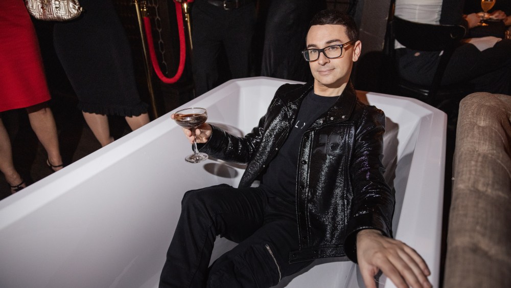 Christian Siriano chills in the tub at the Bathtub Gin speakeasy.