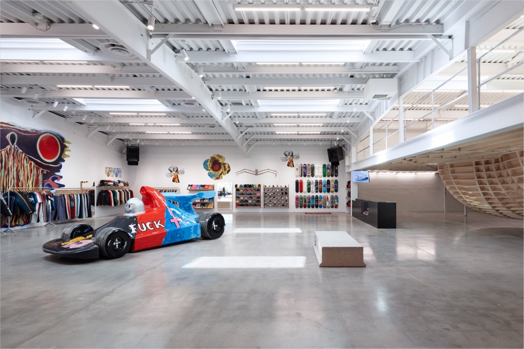 The Supreme store, with race car.