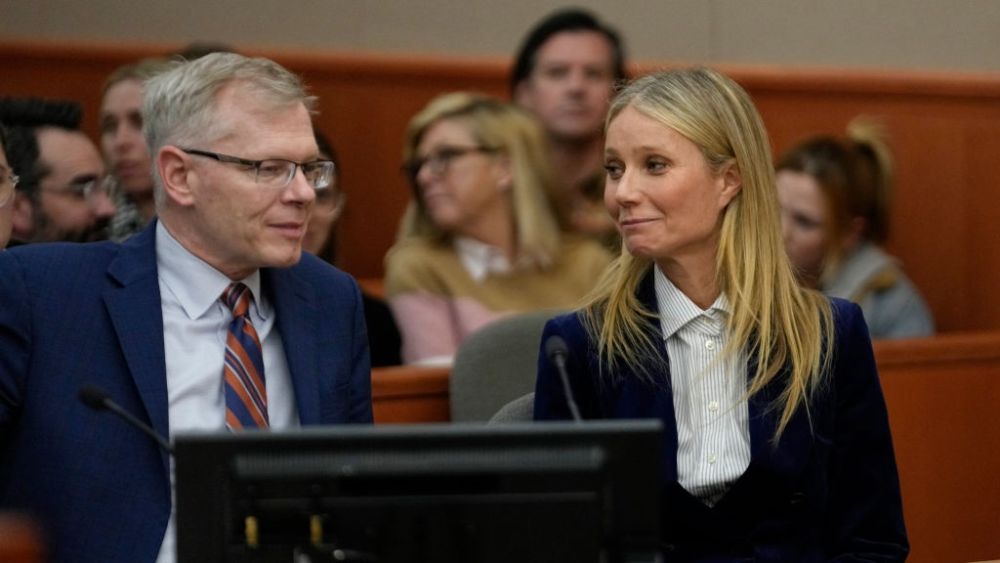 PARK CITY, UTAH - MARCH 30:  Actor Gwyneth Paltrow and attorney Steve Owens react as the verdict is read in her civil trial over a collision with another skier on March 30, 2023, in Park City, Utah. The jury found retired optometrist Terry Sanderson "100 percent" at fault in the mishap that occurred during a run at Deer Valley Resort in Park City, Utah in 2016. Paltrow was awarded the $1 for which she had countersued.  (Photo by Rick Bowmer-Pool/Getty Images)