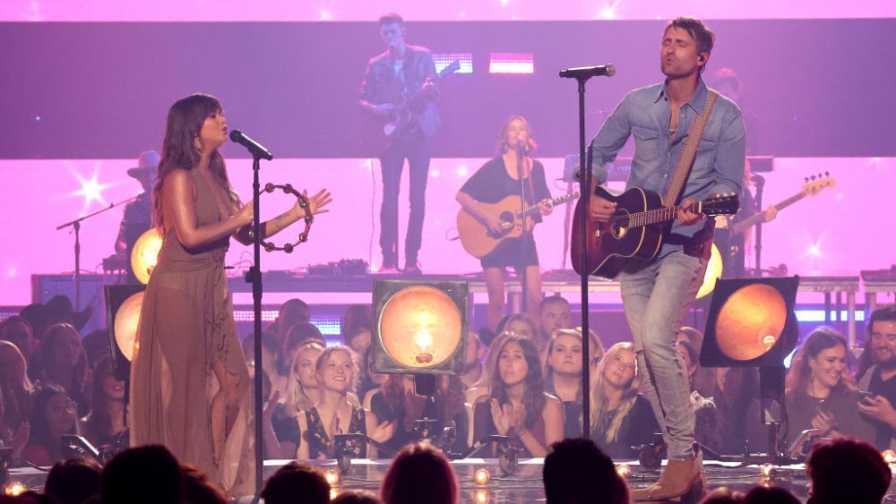 cmt music awards free events, NASHVILLE, TENNESSEE - APRIL 11: Maren Morris and Ryan Hurd perform at the 2022 CMT Music Awards at Nashville Municipal Auditorium on April 11, 2022 in Nashville, Tennessee. (Photo by Mike Coppola/Getty Images for CMT)