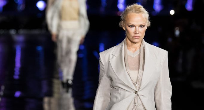 Pamela Anderson walks the runway during the Boss spring 2023 runway show on March 15 in Miami.