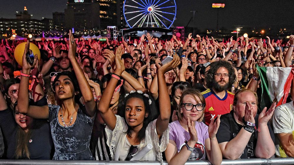 LAS VEGAS, NV - OCTOBER 26: (EDITORS NOTE: Image was processed using digital filters) Fans watch a performance by Broken Bells during the Life is Beautiful festival on October 26, 2014 in Las Vegas, Nevada.  (Photo by Ethan Miller/Getty Images)