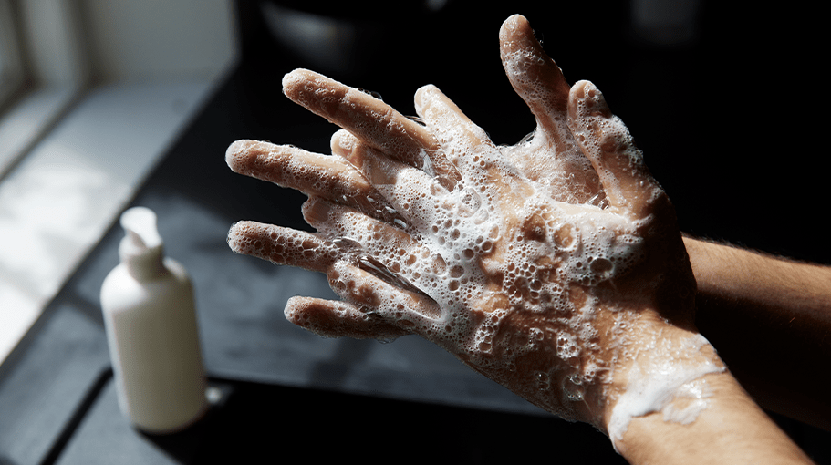 person washing hands