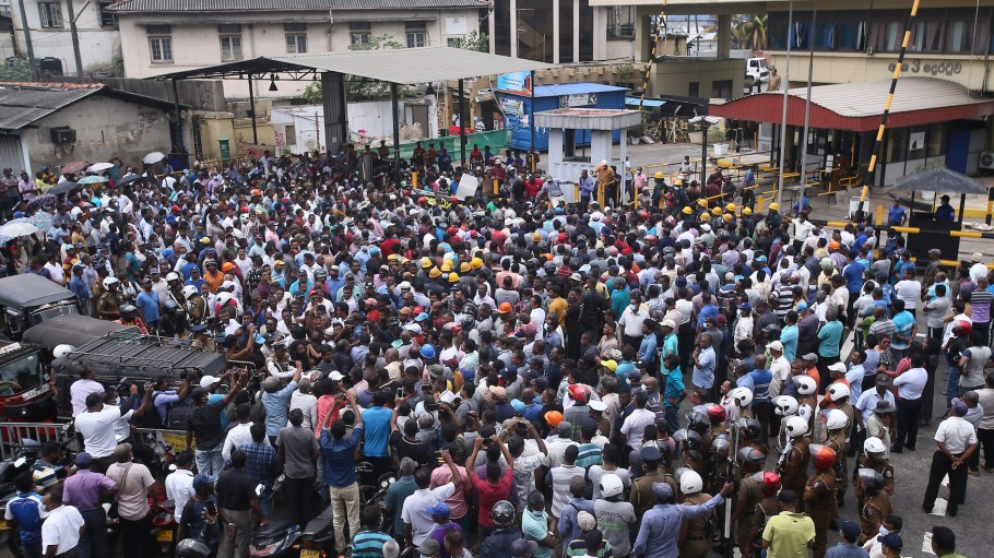 Members of Sri Lankan trade unions protest in front of the port in Colombo, Sri Lanka, on March 1, 2023. A number of trade unions in the essential services sector including electricity, petroleum, water, ports, education and banks engaged in a one-day strike across the country.