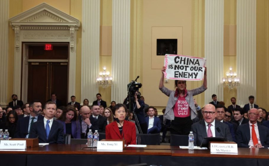 A protester disrupts the first hearing of the U.S. House Select Committee on Strategic Competition between the United States and the Chinese Communist Party at the Cannon House Office Building on Feb. 28, 2023 in Washington, DC.