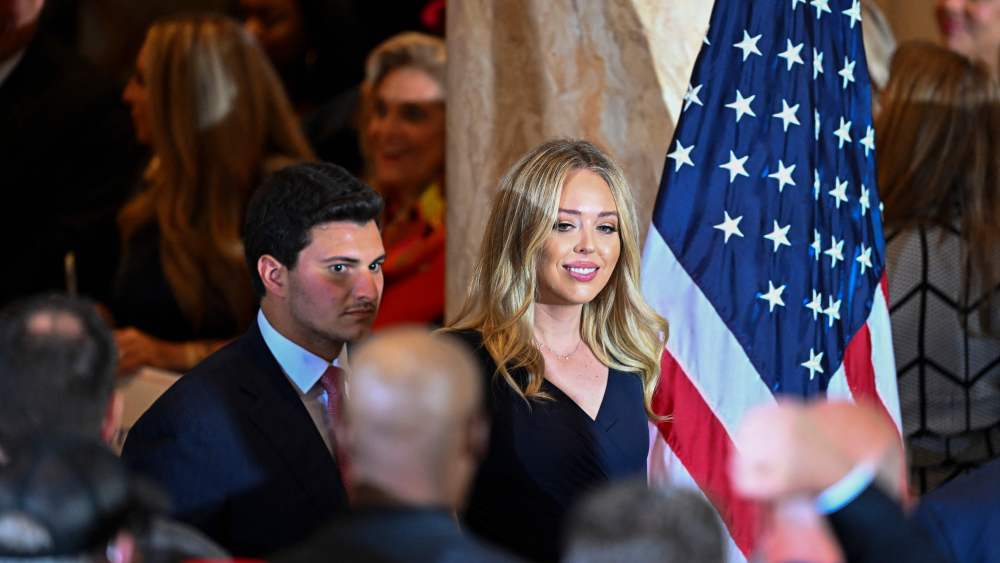 Tiffany Trump and her husband Michael Boulos attend former US president Donald Trump's press conference following his court appearance over an alleged 'hush-money' payment, at his Mar-a-Lago estate in Palm Beach, Florida, on April 4, 2023. (Photo by CHANDAN KHANNA / AFP) (Photo by CHANDAN KHANNA/AFP via Getty Images)