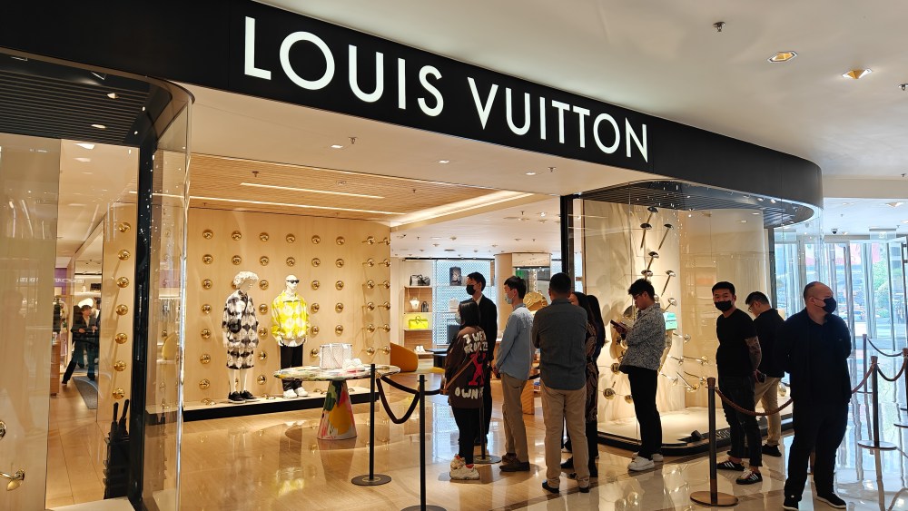 SHANGHAI, CHINA - APRIL 17, 2023 - Customers line up in front of a Louis Vuitton store in Shanghai, China, April 17, 2023. (Photo credit should read CFOTO/Future Publishing via Getty Images)