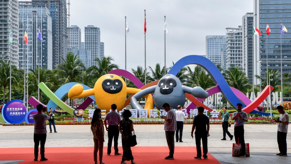 HAIKOU, CHINA - APRIL 11: Visitors take photos of mascots for the 3rd China International Consumer Products Expo outside Hainan International Convention and Exhibition Center on April 11, 2023 in Haikou, Hainan Province of China. (Photo by Luo Yunfei/China News Service/VCG via Getty Images)