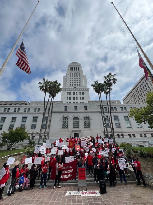 Garment Worker Center members and allies convened at City Hall on Monday.
