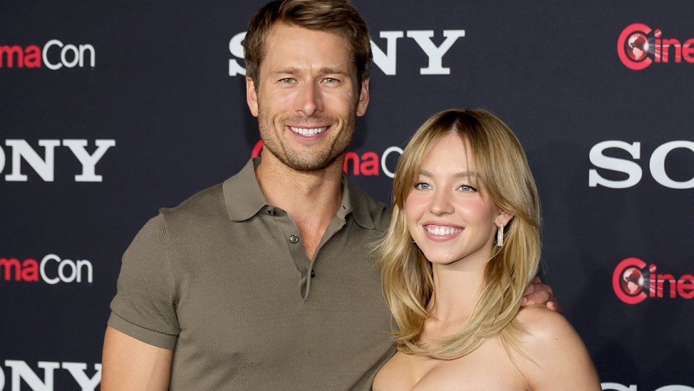 LAS VEGAS, NEVADA - APRIL 24: (L-R) Glen Powell and Sydney Sweeney pose for photos as they promote the upcoming film "Anyone But You" at the Sony Pictures Entertainment presentation during CinemaCon, the official convention of the National Association of Theatre Owners, at The Colosseum at Caesars Palace on April 24, 2023 in Las Vegas, Nevada. (Photo by Ethan Miller/Getty Images)