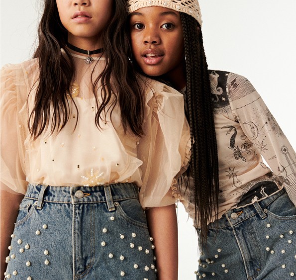 The girls' collection features denim embellished with recycled pearls and rhinestones.