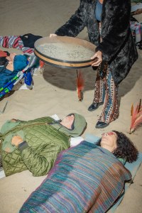 The scene at the Sacred Woman Collective sunset circle in Santa Monica, California.