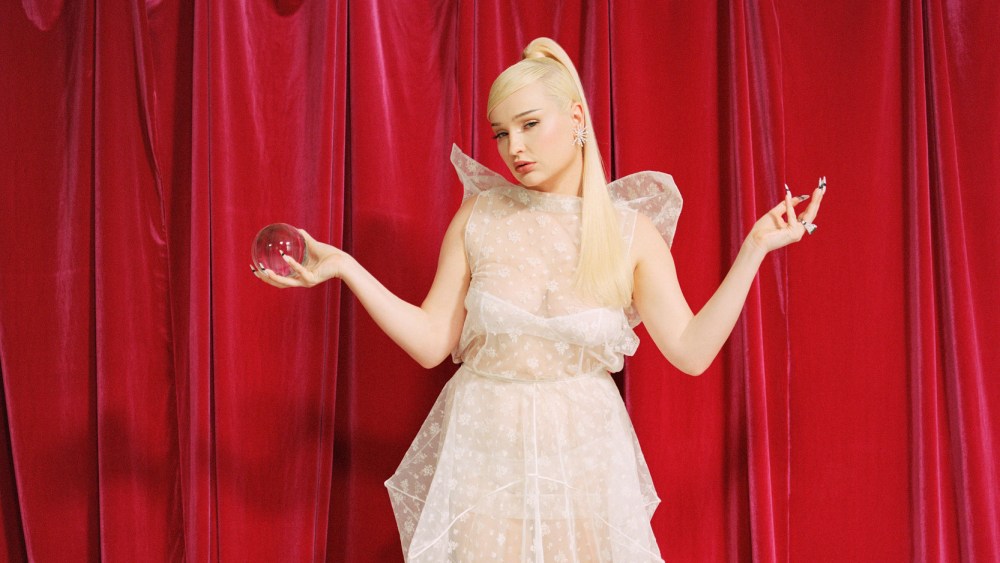 Acne Studios’ dry flocked tulle skirt, dress and boots and mesh flocked underwear and bra. Gismondi 1754 Raggio Di Sole earrings in 18-karat white gold, white diamonds and yellow diamonds; Gismondi 1754 18-karat white gold ring with emerald and white diamonds; Graziela x Muzo 18-karat white gold ring; Muzo Colombian emerald and diamonds.