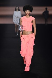SYDNEY, AUSTRALIA - MAY 18: A model walks the runway during the Cue - Presented by Afterpay show during Afterpay Australian Fashion Week 2023 at Carriageworks on May 18, 2023 in Sydney, Australia. (Photo by Stefan Gosatti/Getty Images for AAFW)