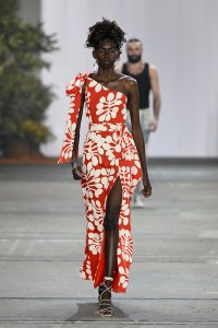 SYDNEY, AUSTRALIA - MAY 18: A model walks the runway during the Ikuntji Artists show during Afterpay Australian Fashion Week 2023 at Carriageworks on May 18, 2023 in Sydney, Australia. (Photo by Stefan Gosatti/Getty Images for AAFW)