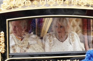 King Charles III and Queen Camilla are carried in the Diamond Jubilee State Coach in the King's Procession from Buckingham Palace to their coronation ceremony London. Picture date: Saturday May 6, 2023. (Photo by Jordan Pettitt/PA Images via Getty Images)