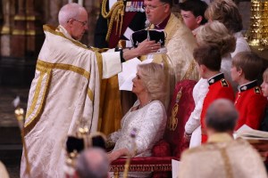 The Archbishop of Canterbury Justin Welby places a modified version of Queen Mary's Crown onto the head of Britain's Camilla, Queen Consort during the Coronation Ceremony inside Westminster Abbey in central London, on May 6, 2023, she will be known as Queen Camilla after the ceremony. - The set-piece coronation is the first in Britain in 70 years, and only the second in history to be televised. Charles will be the 40th reigning monarch to be crowned at the central London church since King William I in 1066. Outside the UK, he is also king of 14 other Commonwealth countries, including Australia, Canada and New Zealand. (Photo by Richard POHLE / POOL / AFP) (Photo by RICHARD POHLE/POOL/AFP via Getty Images)