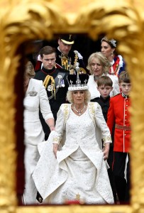 LONDON, ENGLAND - MAY 06: Britain's Queen Camilla followed by Prince William, Prince of Wales and Catherine, Princess of Wales leave Westminster Abbey following the coronation ceremony on May 6, 2023 in London, England. The Coronation of Charles III and his wife, Camilla, as King and Queen of the United Kingdom of Great Britain and Northern Ireland, and the other Commonwealth realms takes place at Westminster Abbey today. Charles acceded to the throne on 8 September 2022, upon the death of his mother, Elizabeth II. (Photo by Toby Melville  - WPA Pool/Getty Images)