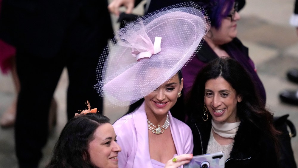 LONDON, ENGLAND - MAY 06: Katy Perry poses for a photograph following the Coronation of King Charles III and Queen Camilla at Westminster Abbey on May 6, 2023 in London, England. The Coronation of Charles III and his wife, Camilla, as King and Queen of the United Kingdom of Great Britain and Northern Ireland, and the other Commonwealth realms takes place at Westminster Abbey today. Charles acceded to the throne on 8 September 2022, upon the death of his mother, Elizabeth II. (Photo by Kirsty Wigglesworth - WPA Pool/Getty Images)