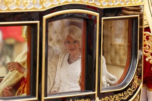 LONDON, ENGLAND - MAY 06: Camilla, Queen Consort travelling in the Diamond Jubilee Coach built in 2012 to commemorate the 60th anniversary of the reign of Queen Elizabeth II, flanked by over a thousand Armed Forces route liners and The Sovereign’s Escort of the Household Cavalry sets off along the Mall from Buckingham Palace on route to Westminster Abbey for the Coronation of King Charles III and Queen Camilla on May 06, 2023 in London, England. The Coronation of Charles III and his wife, Camilla, as King and Queen of the United Kingdom of Great Britain and Northern Ireland, and the other Commonwealth realms takes place at Westminster Abbey today. Charles acceded to the throne on 8 September 2022, upon the death of his mother, Elizabeth II. (Photo by Richard Heathcote/Getty Images)