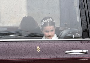 LONDON, ENGLAND - MAY 06: Princess Charlotte of Wales travelling in the state car during the Coronation of King Charles III and Queen Camilla on May 06, 2023 in London, England. The Coronation of Charles III and his wife, Camilla, as King and Queen of the United Kingdom of Great Britain and Northern Ireland, and the other Commonwealth realms takes place at Westminster Abbey today. Charles acceded to the throne on 8 September 2022, upon the death of his mother, Elizabeth II. (Photo by Stuart C. Wilson/Getty Images)