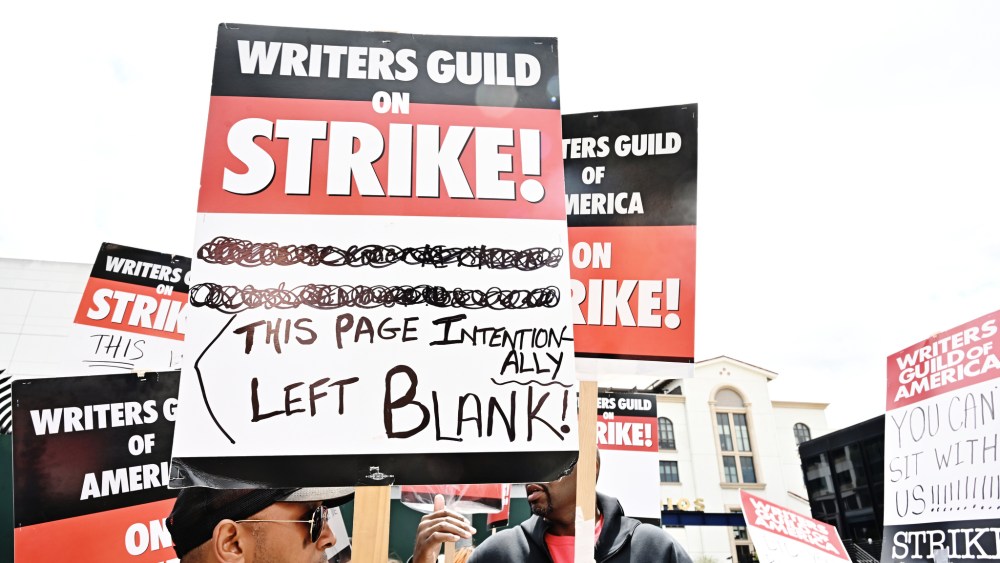 Protests in support of the Writers Guild of America strike walk outside at Universal Studios on May 5, 2023 in Los Angeles, California.