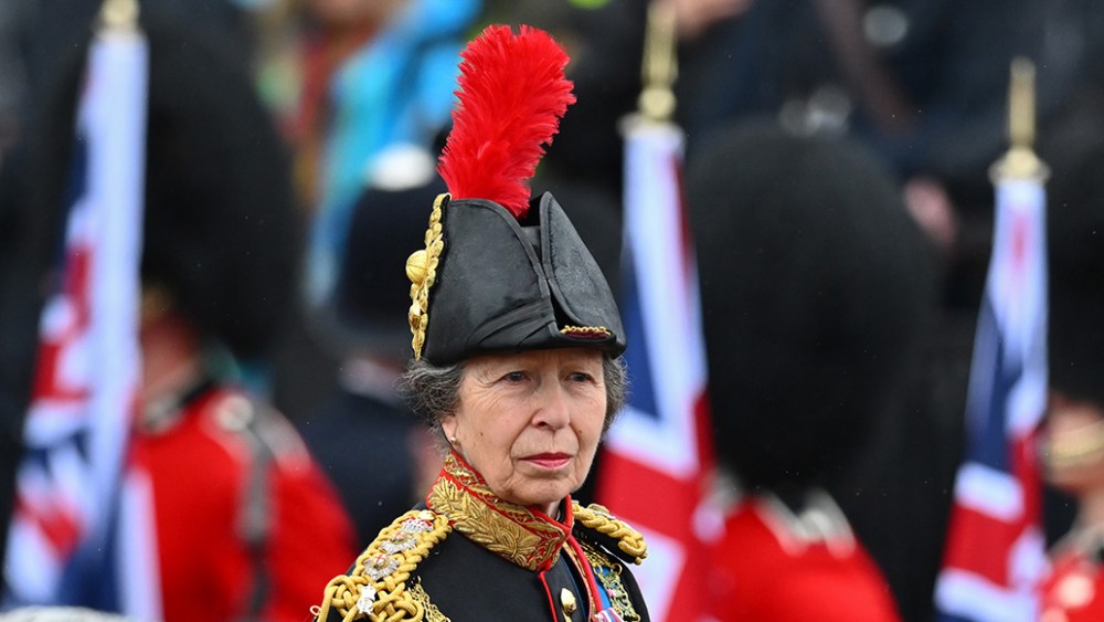 LONDON, ENGLAND - MAY 06: Princess Anne feather hat, Princess Royal rides on horseback behind the gold state coach carrying the newly crowned King and Queen Consort as they travel down The Mall during the Coronation of King Charles III and Queen Camilla on May 06, 2023 in London, England. The Coronation of Charles III and his wife, Camilla, as King and Queen of the United Kingdom of Great Britain and Northern Ireland, and the other Commonwealth realms takes place at Westminster Abbey today. Charles acceded to the throne on 8 September 2022, upon the death of his mother, Elizabeth II. (Photo by Dan Mullan/Getty Images)