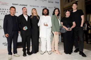Winners Louis-Gabriel Nouchi, Duran Lantink, Ester Manas and Balthazar Delepierre with ANDAM founder Nathalie Dufour, this year's mentor Riccardo Bellini and French culture minister Rima Abdul Malak.