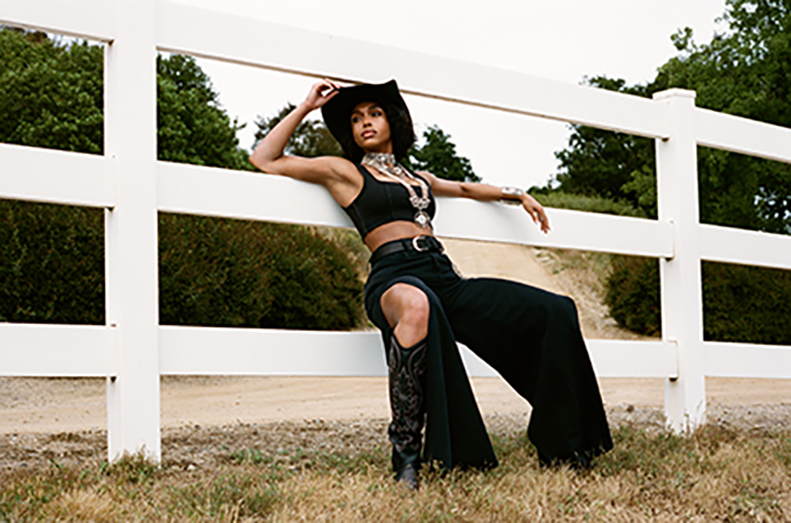 Lori Harvey posing in Good American's latest denim campaign.