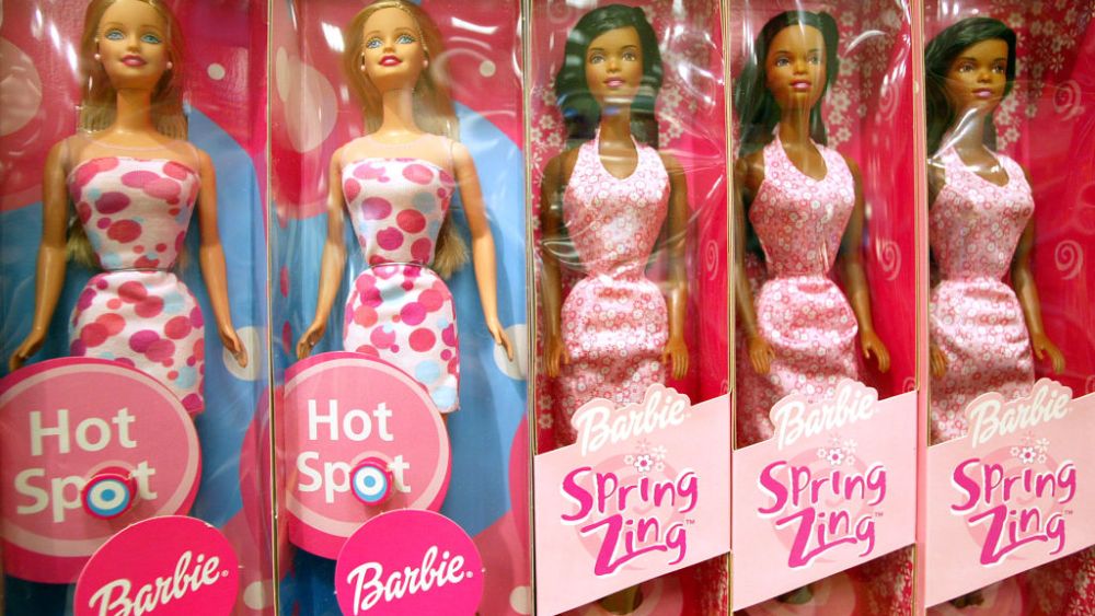 Barbie dolls on a shelf in 2002.