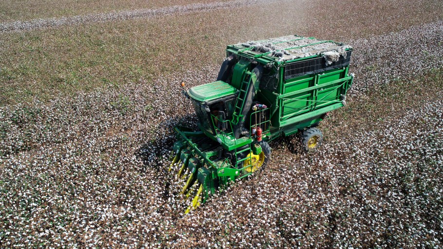 A drone photo shows an aerial view of farmers harvesting cotton by the help of a combine harvester at a field in Cukurova district of Adana, Turkey.