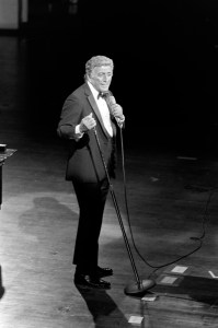 Tony Bennett performs onstage during an event at the Kennedy Center in Washington, D.C. in 1990.