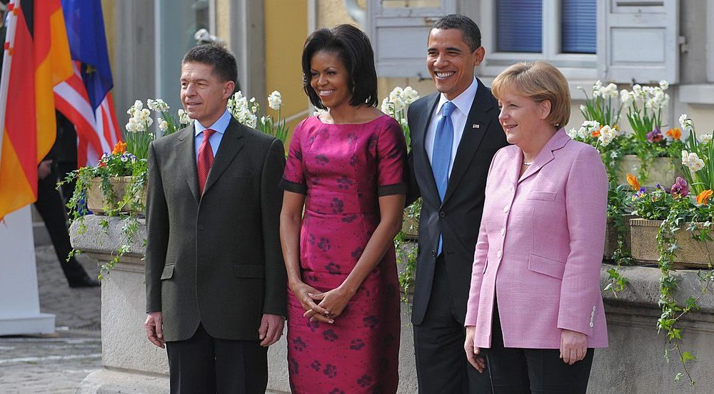 President Barack Obama and First Lady Michelle Obama pose with German Chancellor Angela Merkel and her husband Joachim Sauer in 2009 during the 60th annual NATO Summit in Baden-Baden, Germany.