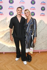 LONDON, ENGLAND - JULY 11: Romeo Beckham and Mia Regan pose in the evian VIP Suite At Wimbledon 2023 on July 11, 2023 in London, England. Pic Credit: Dave Benett