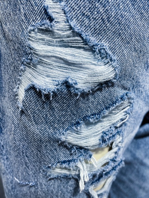 Bleach ripped blue jeans.