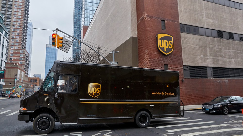 A UPS truck leaves a UPS facility in New York City.