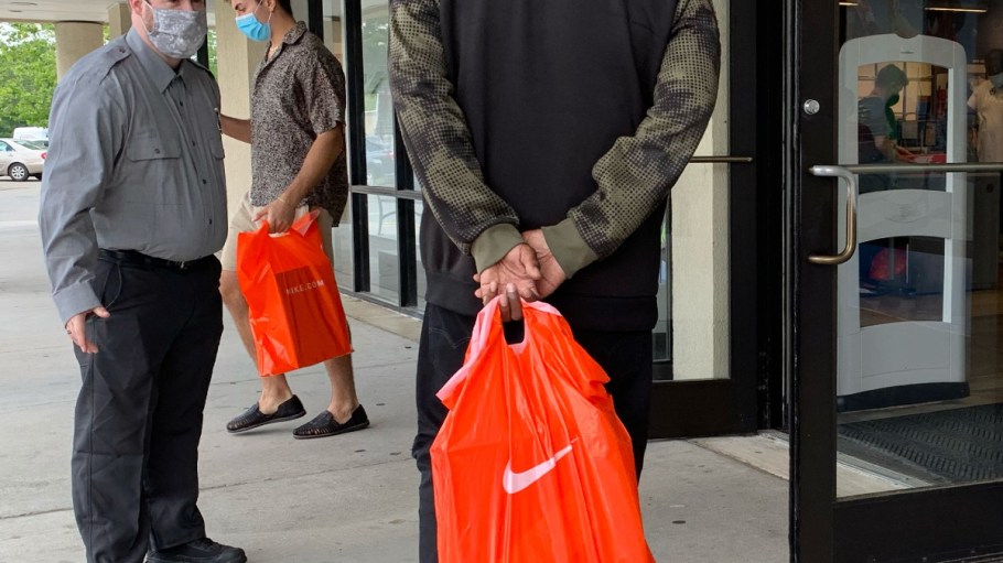 A shopper holding a Nike bag in Maryland.