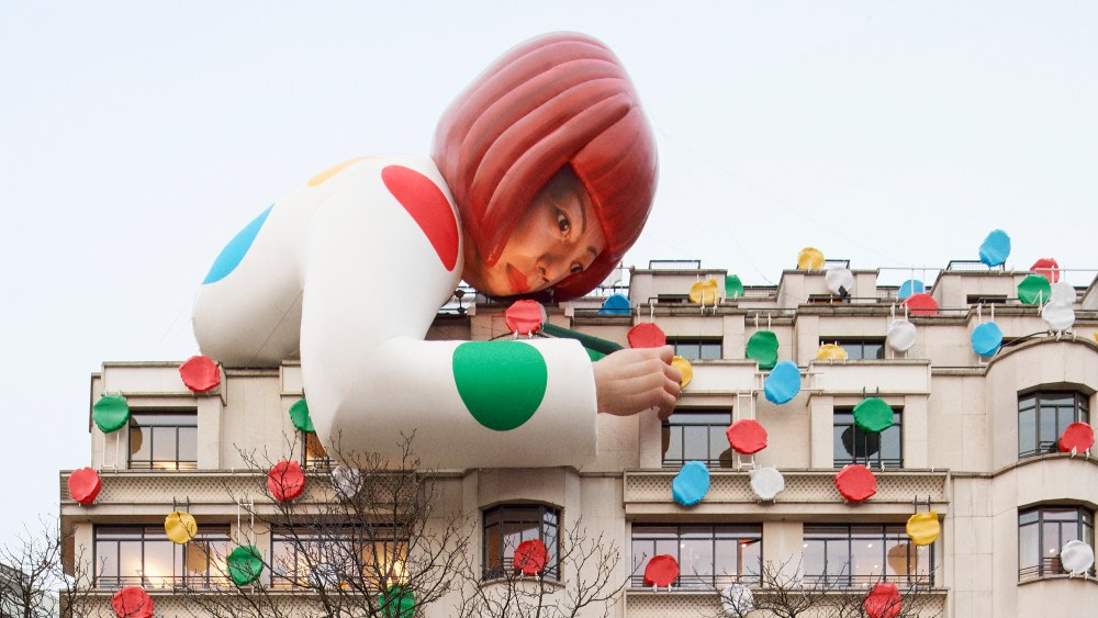 An inflatable sculpture of Yayoi Kusama at the Louis Vuitton flagship on Avenue des Champs-Elysées in Paris.