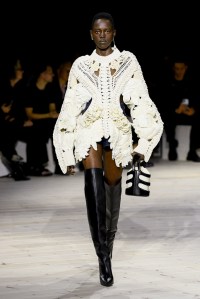 Model on the runway at Alexander McQueen Ready To Wear Spring 2024 held at Careau du Temple on September 30, 2023 in Paris, France.