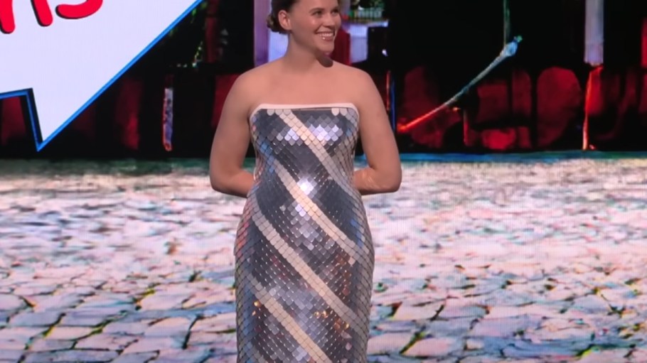 Christine Dierk, a researcher at Adobe, wears a dress that changes colors and patterns with the click of a button, to sneak preview the company's Project Primrose.