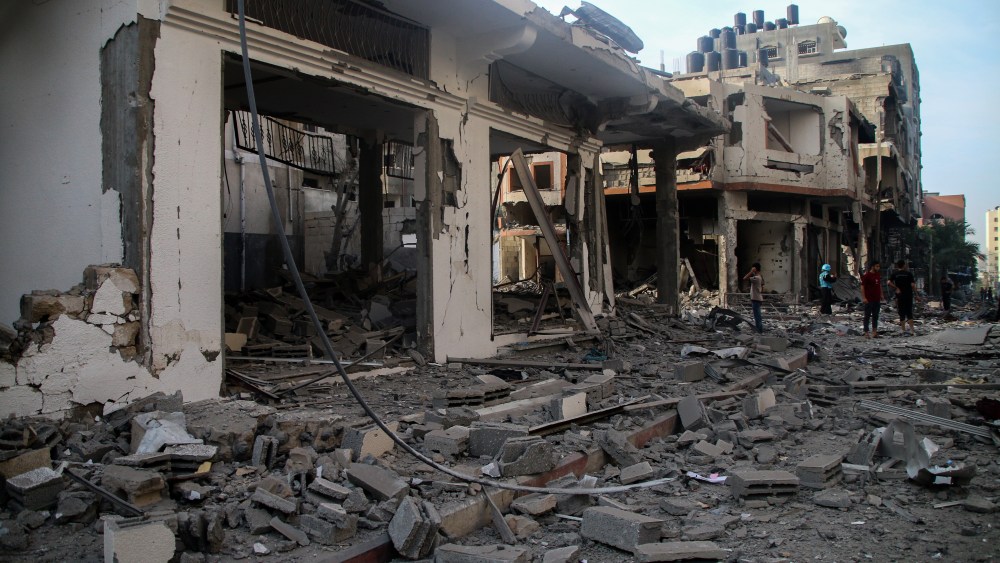 GAZA CITY, GAZA - OCTOBER 11:  Palestinian citizens inspect damage to their homes caused by Israeli airstrikes in the Karama area, northern Gaza Strip October 11, 2023 in Gaza City, Gaza. Almost 800 people have died in Gaza, and 187, 000 displaced, after Israel launched sustained retaliatory air strikes after a large-scale attack by Hamas. On October 7, the Palestinian militant group Hamas launched a surprise attack on Israel from Gaza by land, sea, and air, killing 1000 people and wounding more than 2000. Israeli soldiers and civilians have also been taken hostage by Hamas and moved into Gaza. The attack prompted a declaration of war by Israeli Prime Minister Benjamin Netanyahu. (Photo by Ahmad Hasaballah/Getty Images)